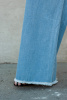 Джинсы Humility голубого цвета с необработанным краем